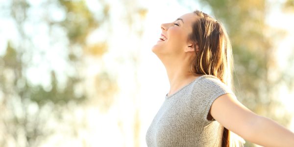 Side,View,Portrait,Of,A,Woman,Breathing,Fresh,Air,Outdoors